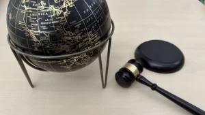 Justice gavel, and a globe